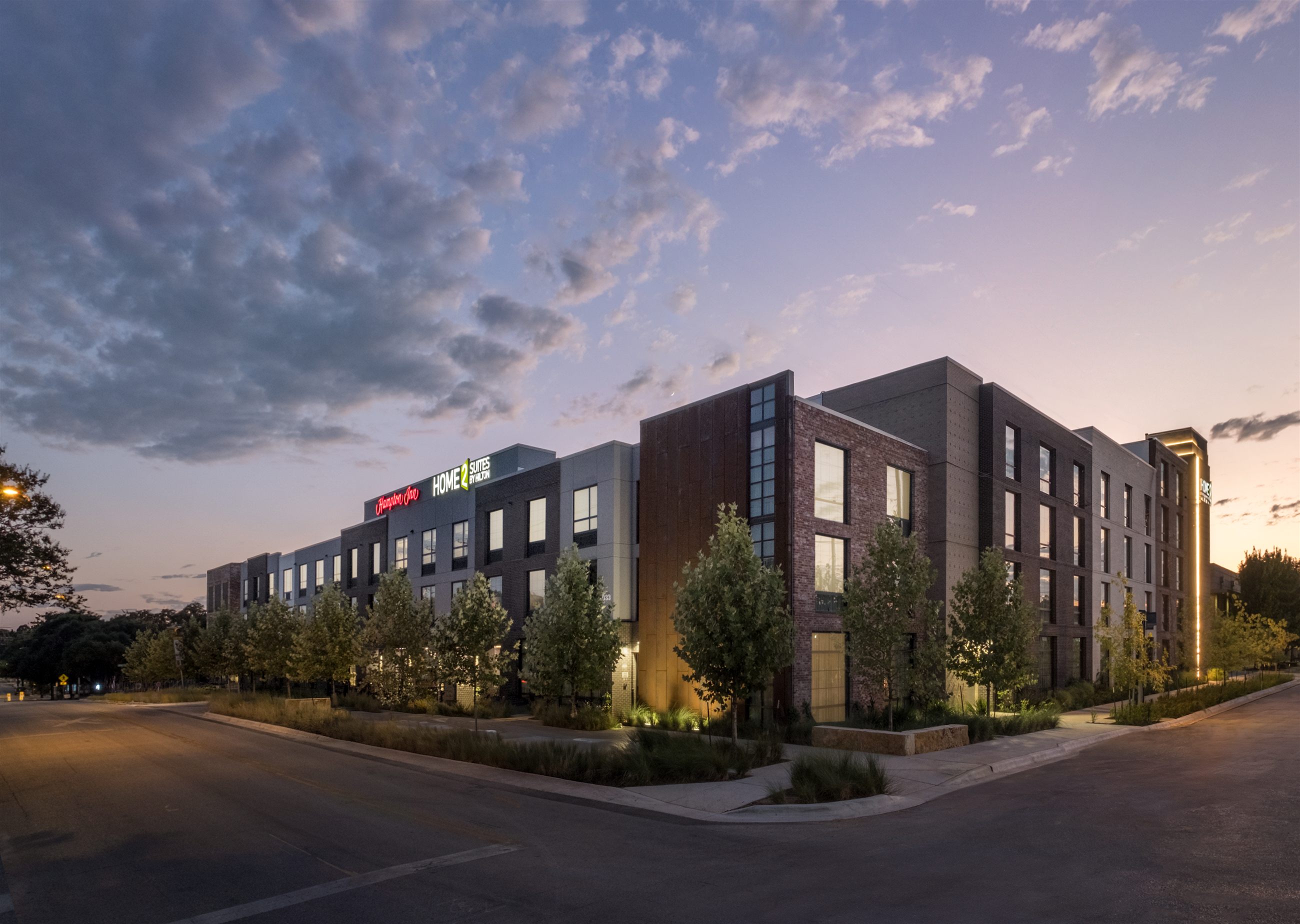 Hampton Inn and Home2 Suites by Hilton, Austin East Side, at dusk